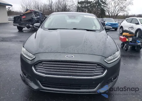 2015 Ford Fusion Titanium Phev z USA, uszkodzony, nr VIN 3FA6P0SU7FR100066